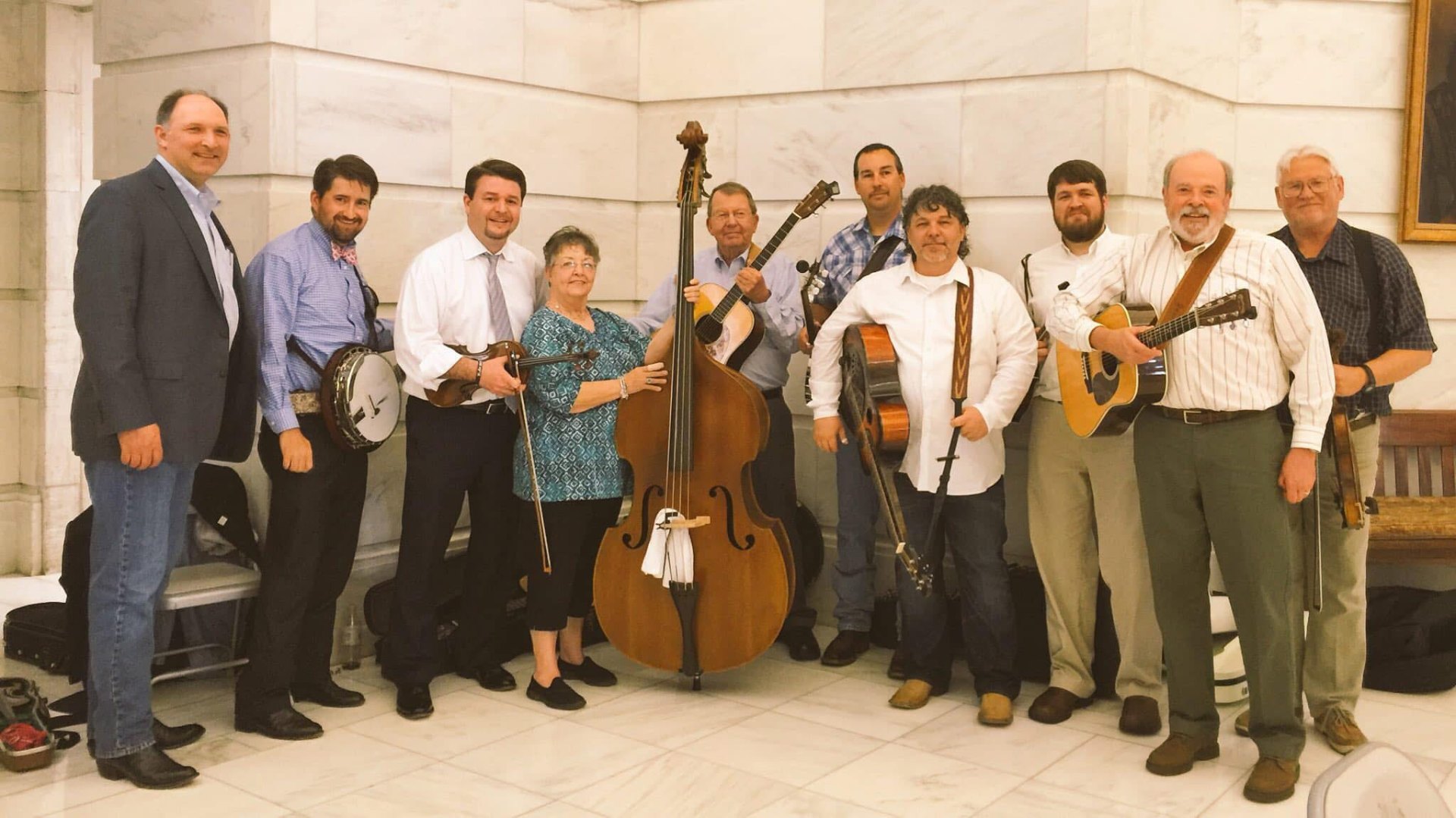 Bluegrass musicians performing in the rotunda of the Arkansas State Capitol