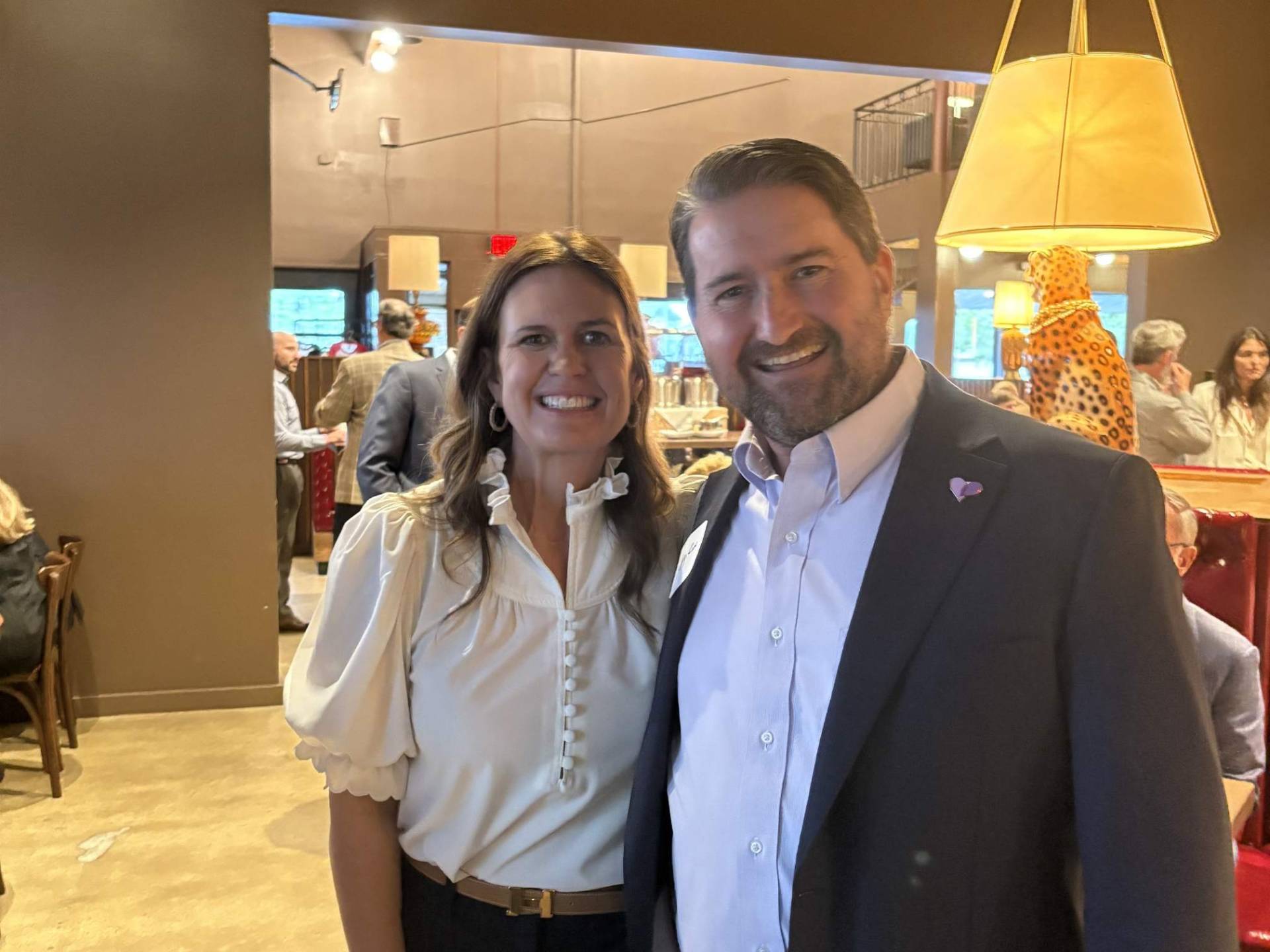 Cory Cox with Arkansas Governor Sarah Huckabee Sanders at a statewide event